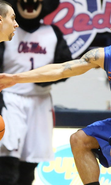 Gators blanket Henderson in second half, survive road scare